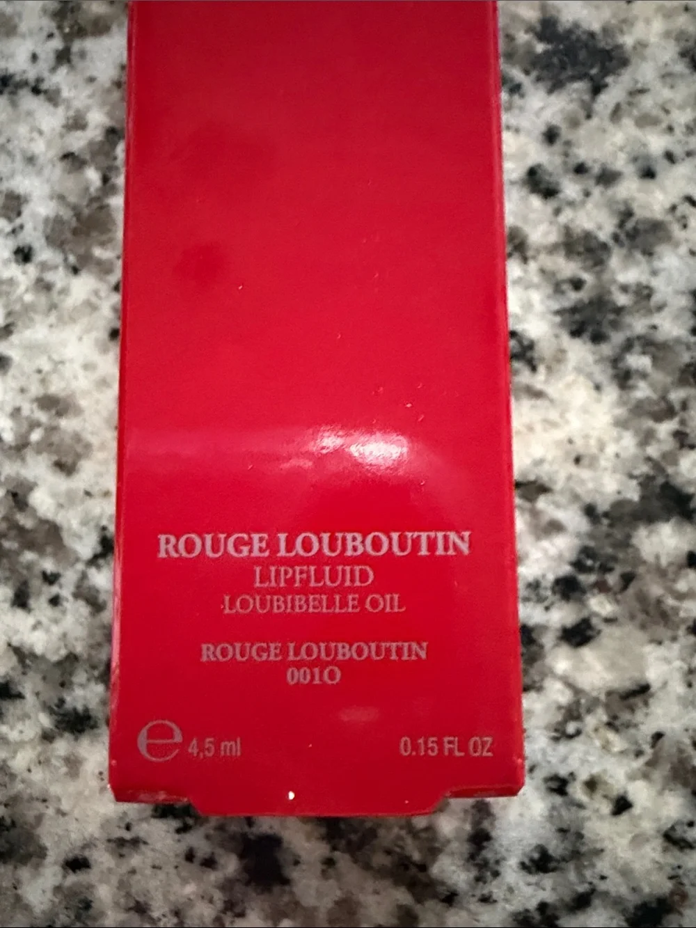 Christian Louboutin Rouge Lip Oil in Vibrant Red